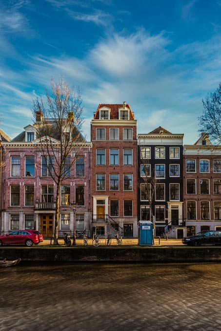 Cityscape. Amsterdam buildings over canal