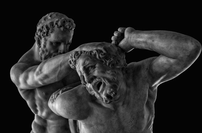 Black and white. culpture representing human being suffering.
